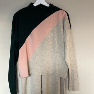 Like new Women’s acrylic suit set, size L